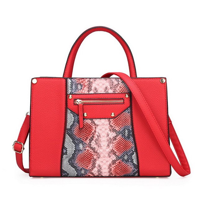 SNAKE SKIN PATTERNED CORAL HANDBAG