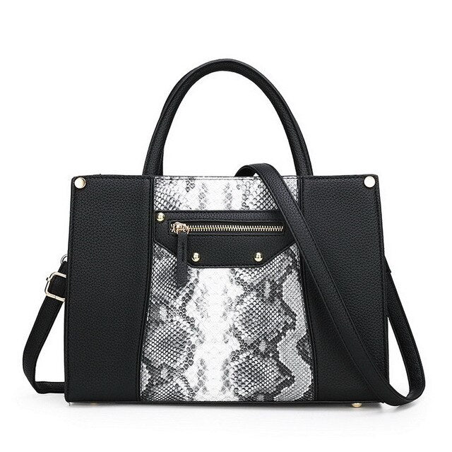 SNAKE SKIN PATTERNED CORAL HANDBAG