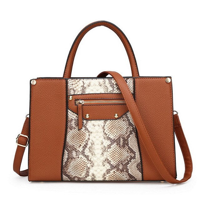 SNAKE SKIN PATTERNED CORAL HANDBAG
