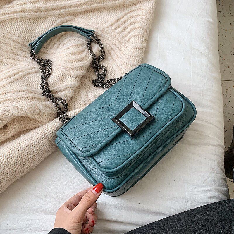 BLACK CHAIN DETAILED BURGUNDY BAG