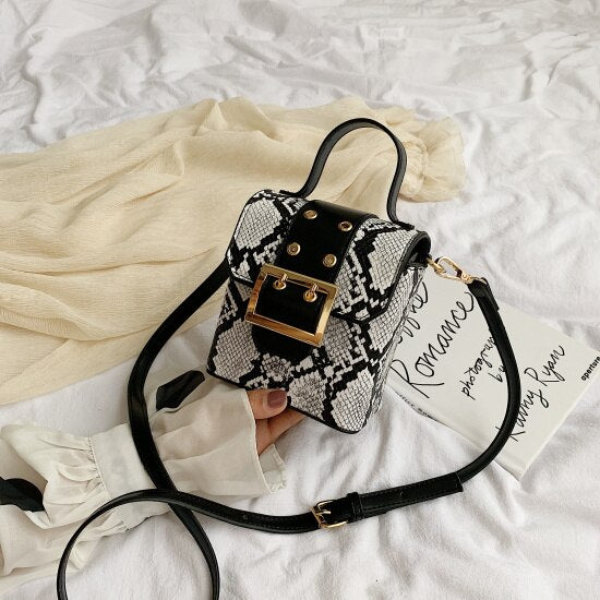 BLACK AND WHITE SERPENTINE BAG