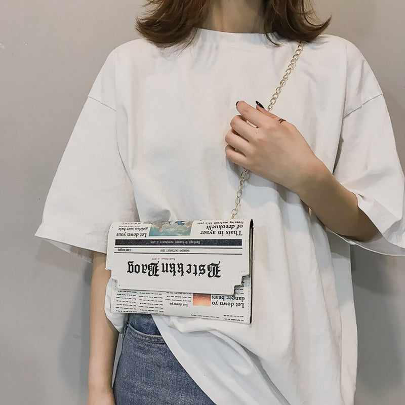 NEWSPAPER PRINTED SHOULDER BAG