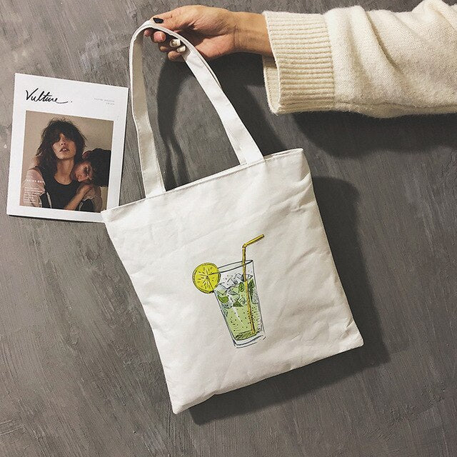 A WOMAN PRINTED CANVAS BAG