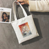 A WOMAN PRINTED CANVAS BAG