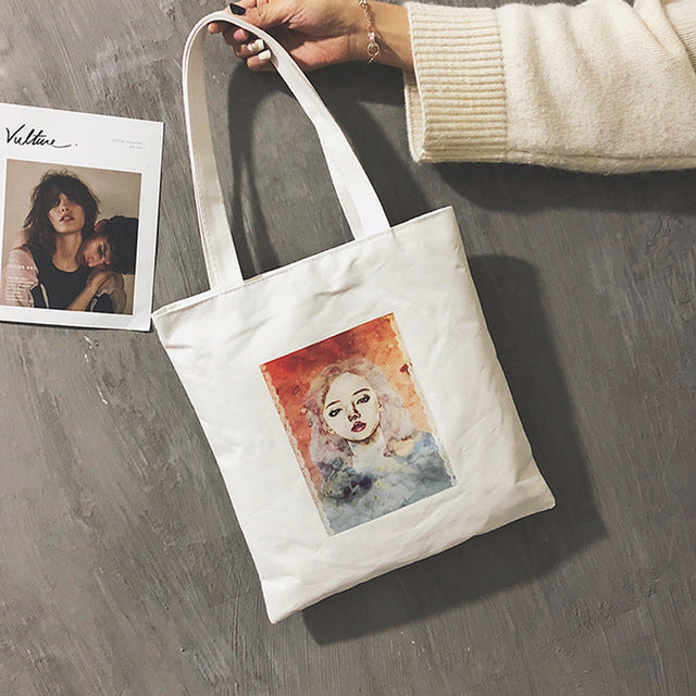 A WOMAN PRINTED CANVAS BAG