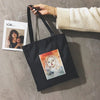 A WOMAN PRINTED CANVAS BAG