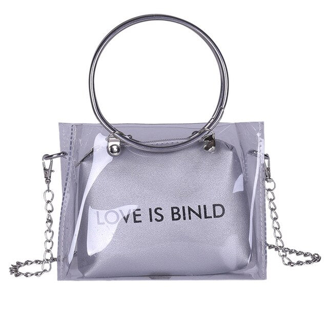 "LOVE IS BINLD" PRINTED TRANSPARENT BAG