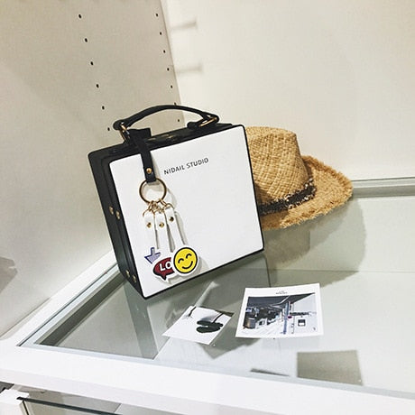 NAVY BLUE AND RED BOX BAG