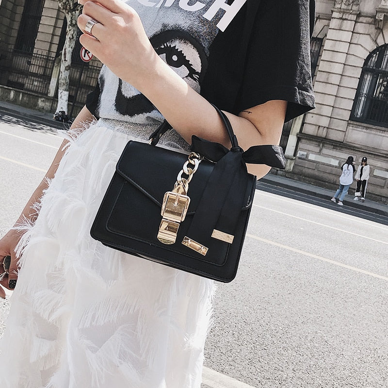 SOLID PINK RIBBON DETAILED HANDBAG