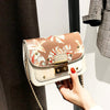 FLORAL PATTER DETAILED SHOULDER BAG